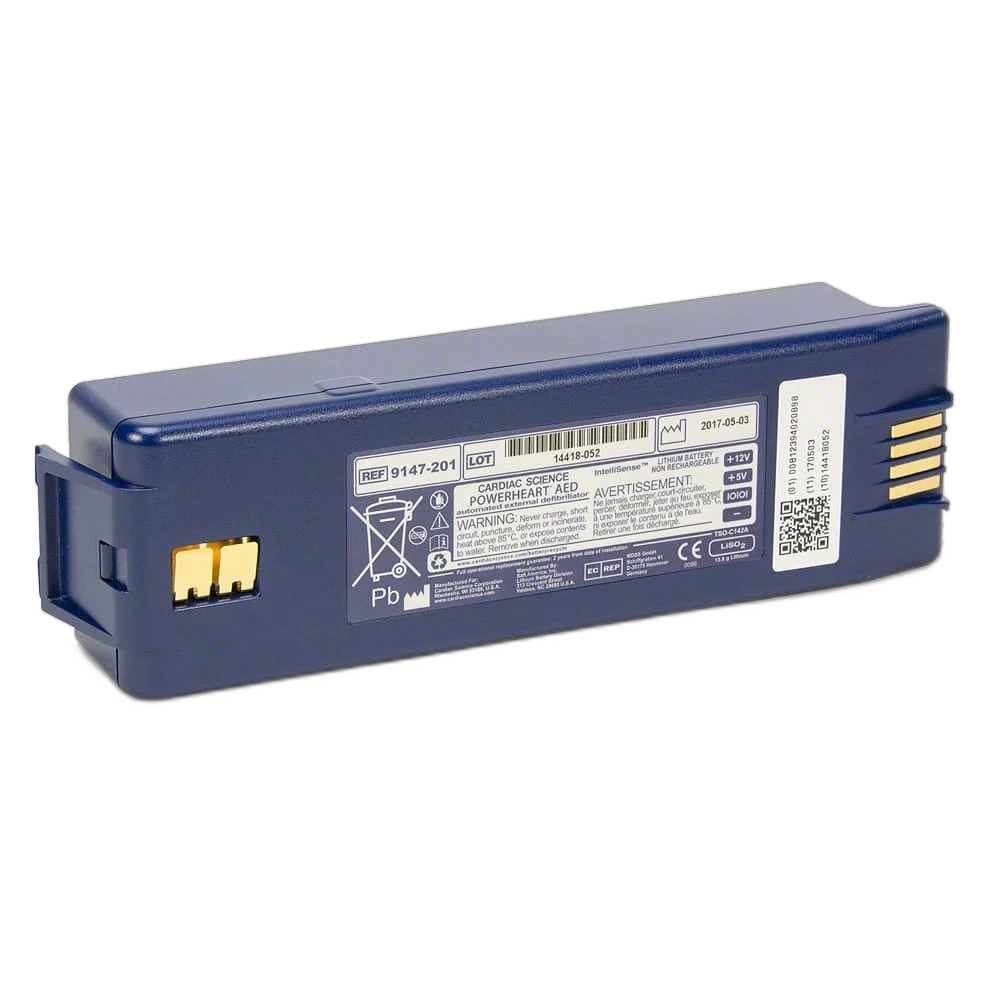 Cardiac Science Powerheart AED IntelliSense Lithium Battery, REF 9147-201, dark blue rectangular battery pack, angled view showing gold contact terminals and warning label