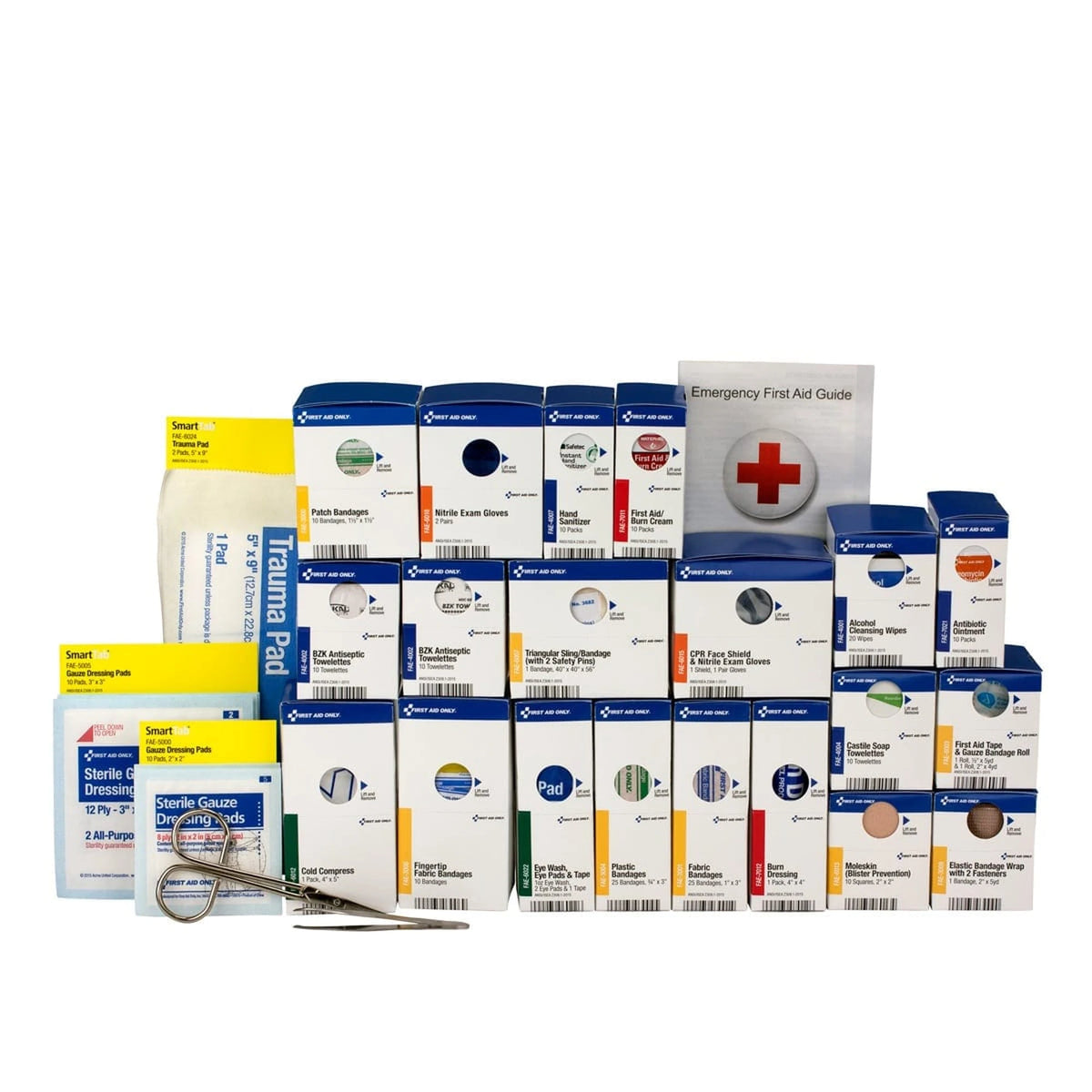 SmartCompliance first aid supplies laid out: trauma pad, gauze pads, first aid guide, and refill boxes