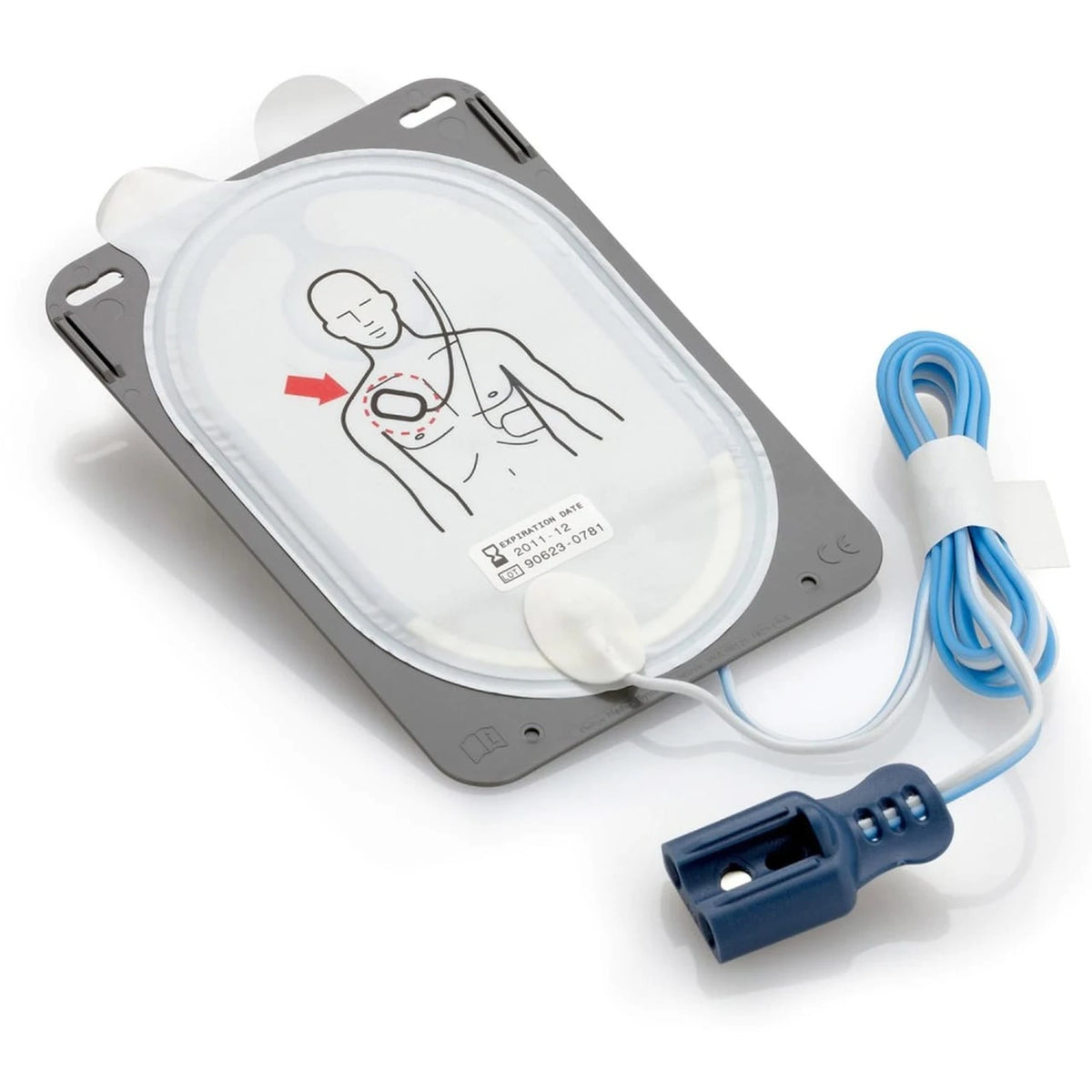 Philips HeartStart Smart Pads III adult electrode pad removed from packaging, oval gray pad with chest placement diagram, connected by blue and white wires to a dark blue connector