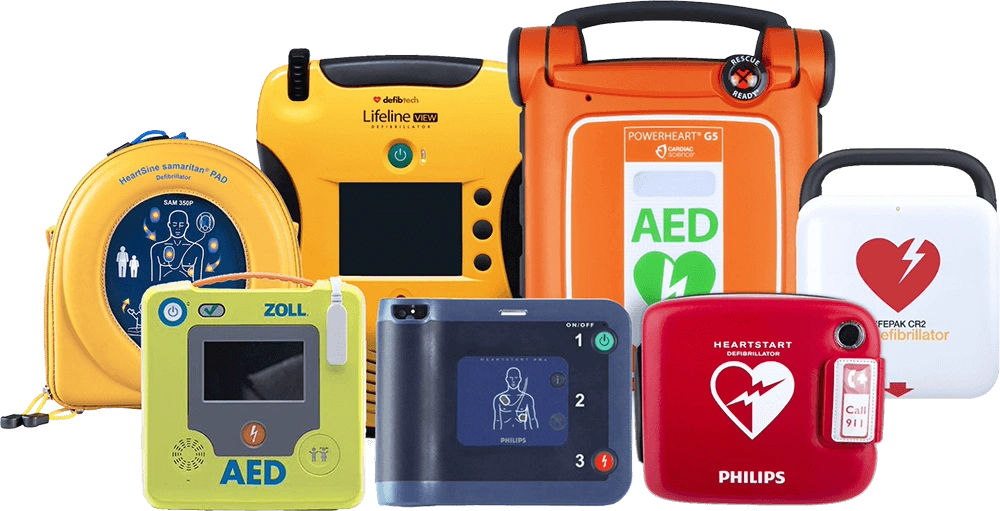 Lineup of several AED defibrillator models from ZOLL, HeartSine, Cardiac Science, Philips, and Physio-Control