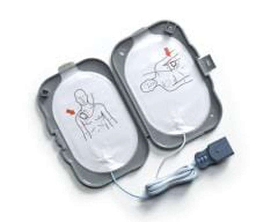 Pair of unfolded AED electrode pads with placement diagrams
