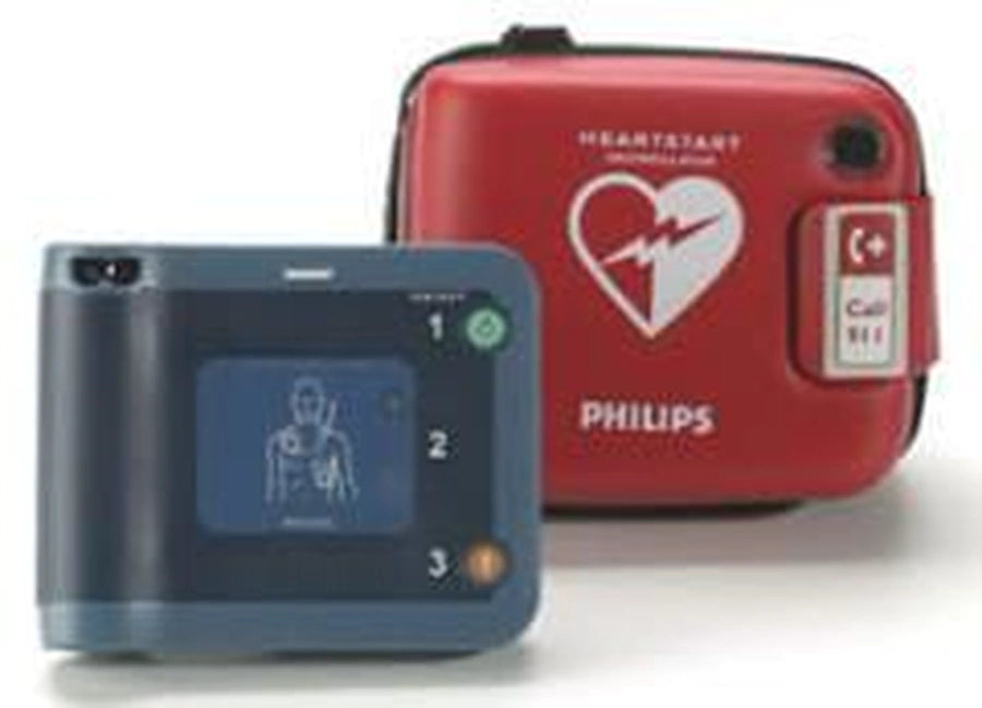 Philips HeartStart FRx AED next to its red carrying case