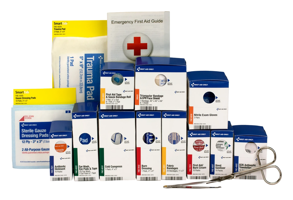Medium SmartCompliance refill pack contents: trauma pad, gauze pads, scissors, and refill boxes