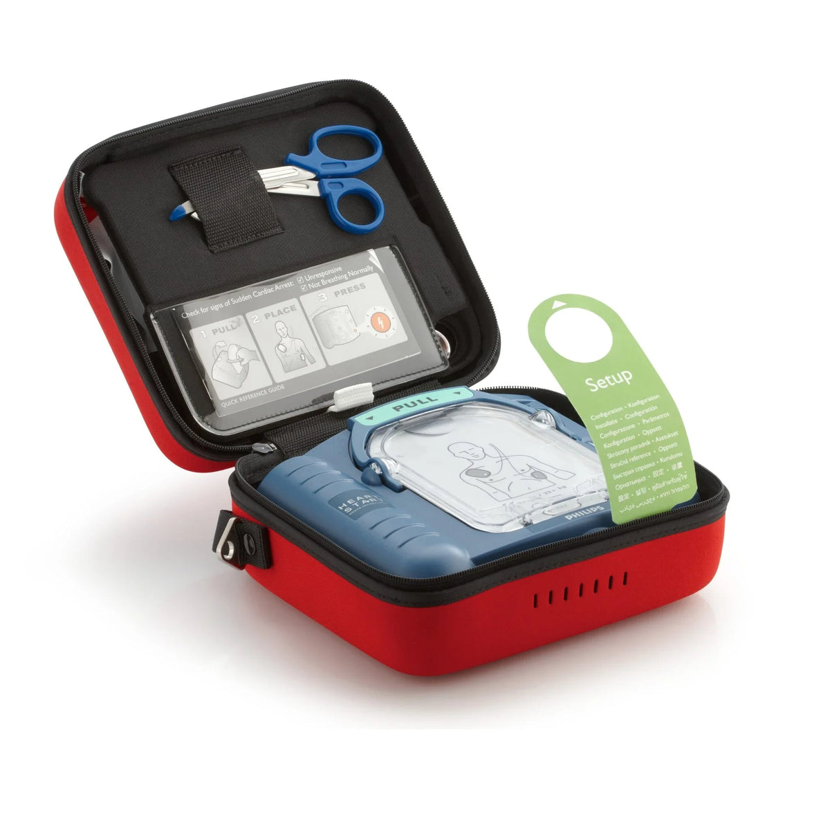Philips HeartStart OnSite AED standard carry case open with the unit inside, setup tag and medical shears