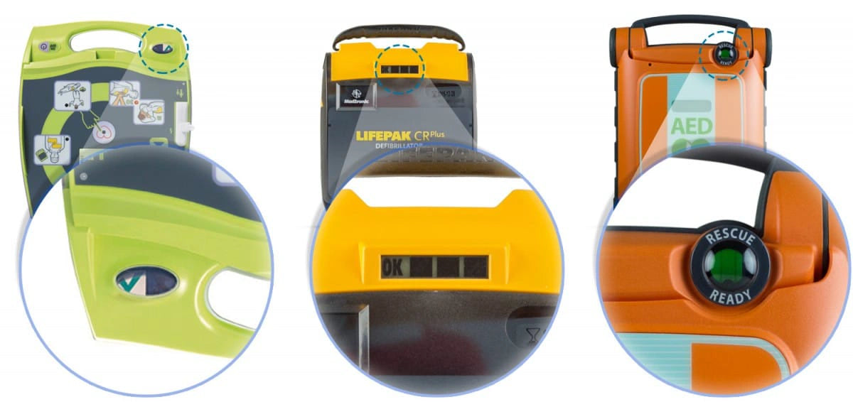 Close-up of AED status indicator lights on three different defibrillator models including a Lifepak CR Plus