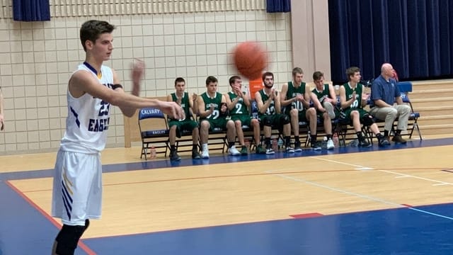 basketball player passing ball