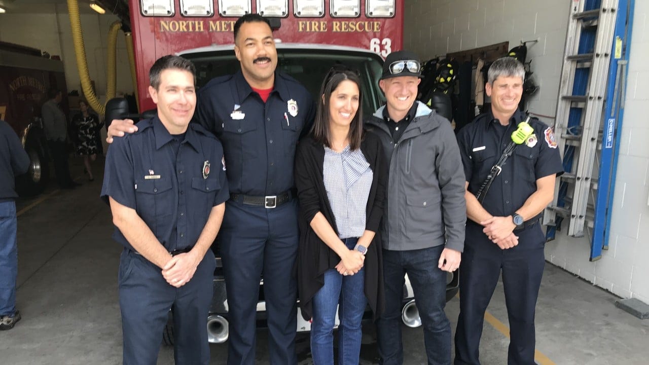 firefighters with couple