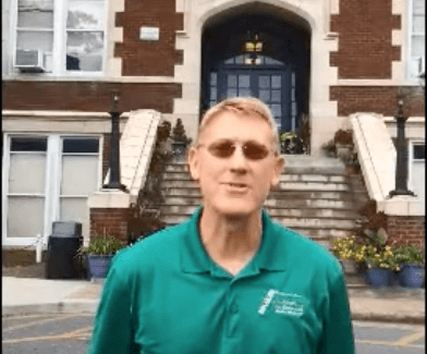 man in front of steps