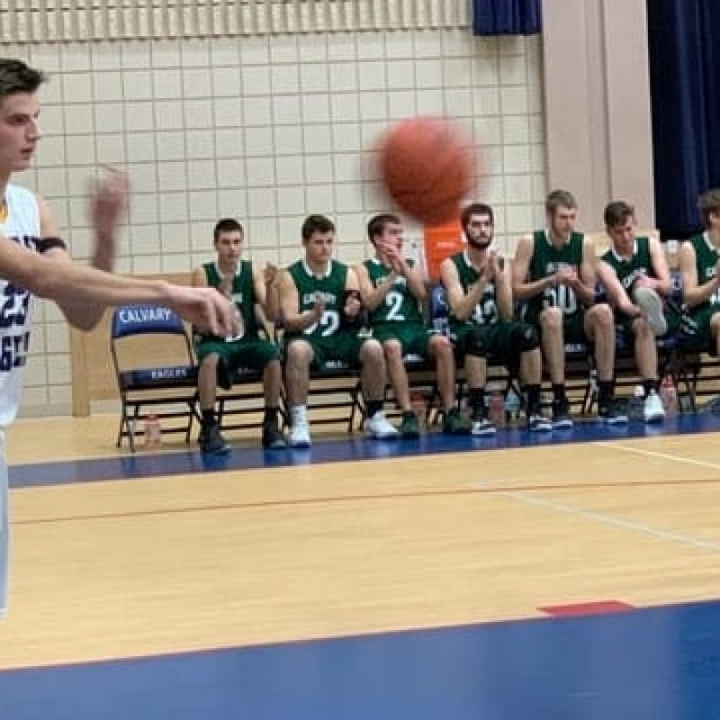 basketball player passing ball